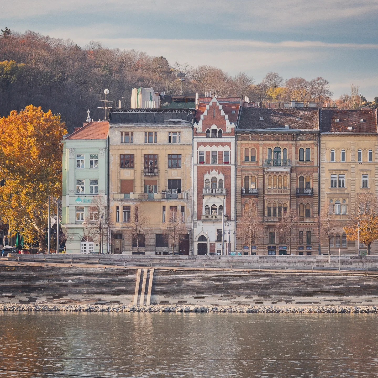 Colorful historic buildings along the Buda side of the Danube River.