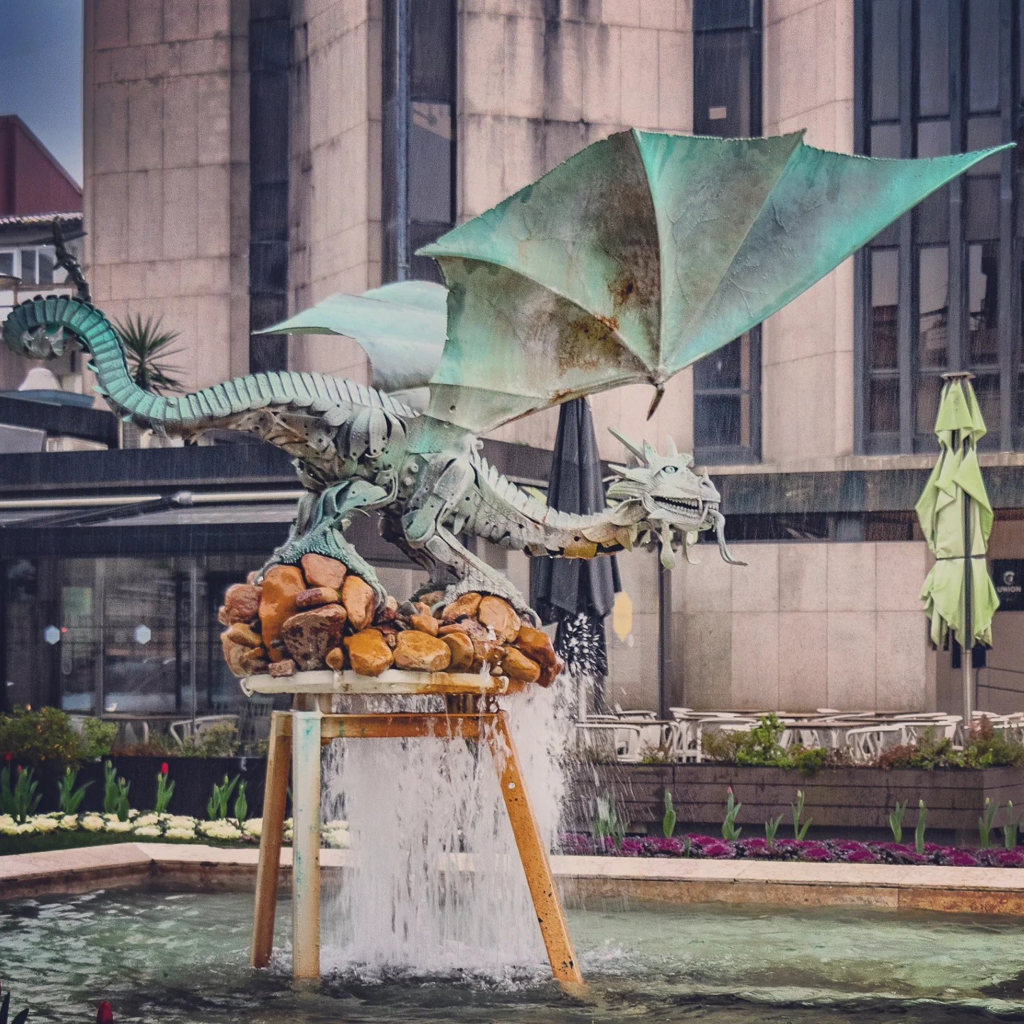 Metal dragon fountain sculpture in Braga, Portugal