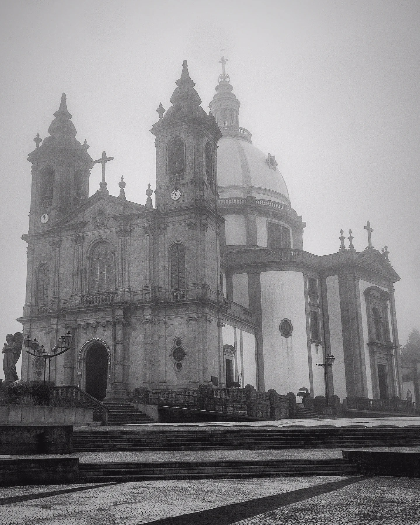 Side view of the Sanctuary of Our Lady of Sameiro, highlighting its domed structure and twin bell towers.