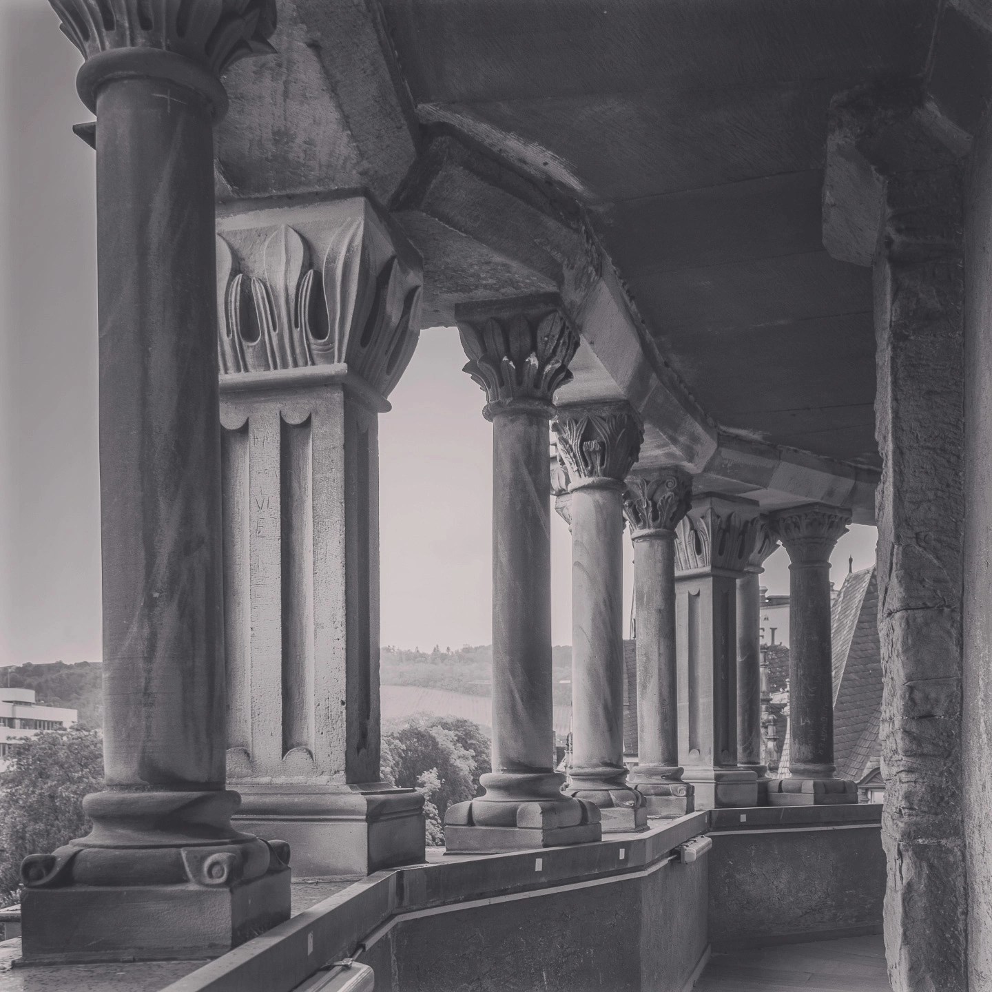Black-and-white photo of Roman-style stone columns in Trier.
