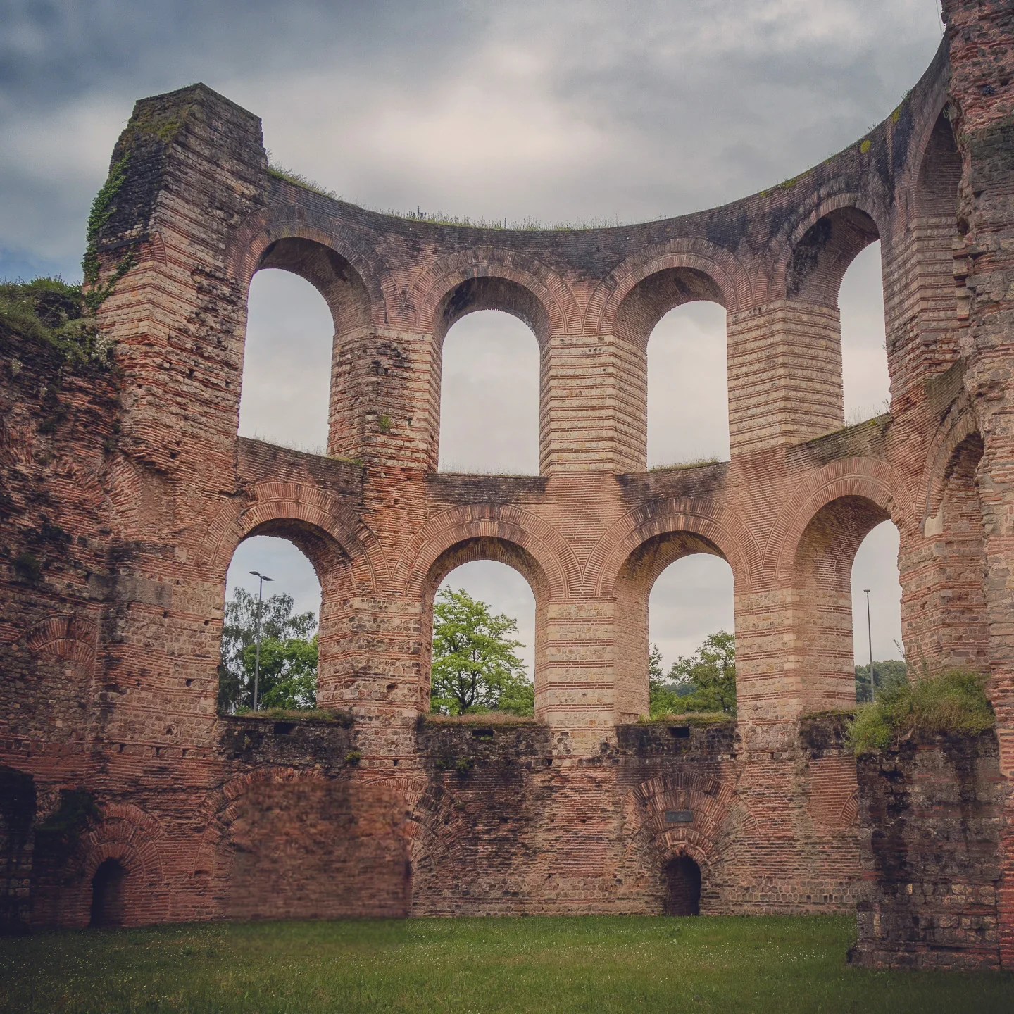 Brick arches and remains of the Imperial Roman Baths in Trier, Germany.