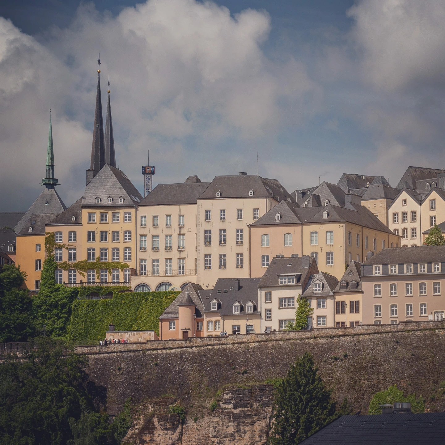 Colorful historic houses perched on the promontory in Luxembourg City’s old town.