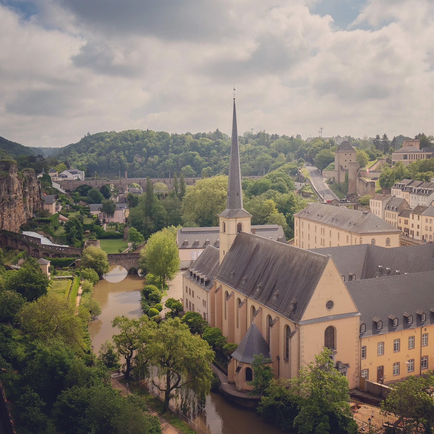 Aerial view of Neumünster Abbey and Alzette River in Luxembourg’s lower city.