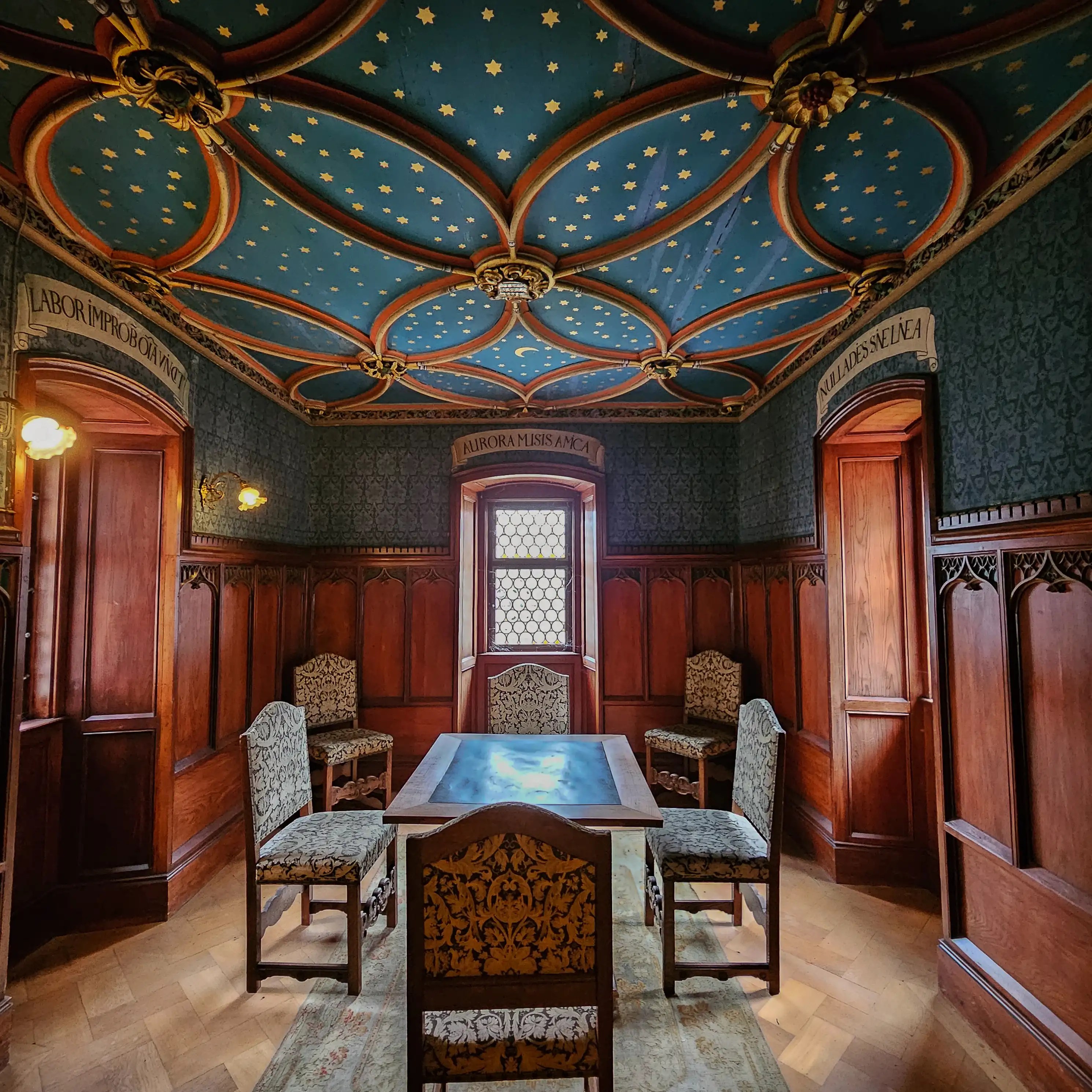 Small richly decorated meeting room with starry blue vaulted ceiling in Bebenhausen Monastery.