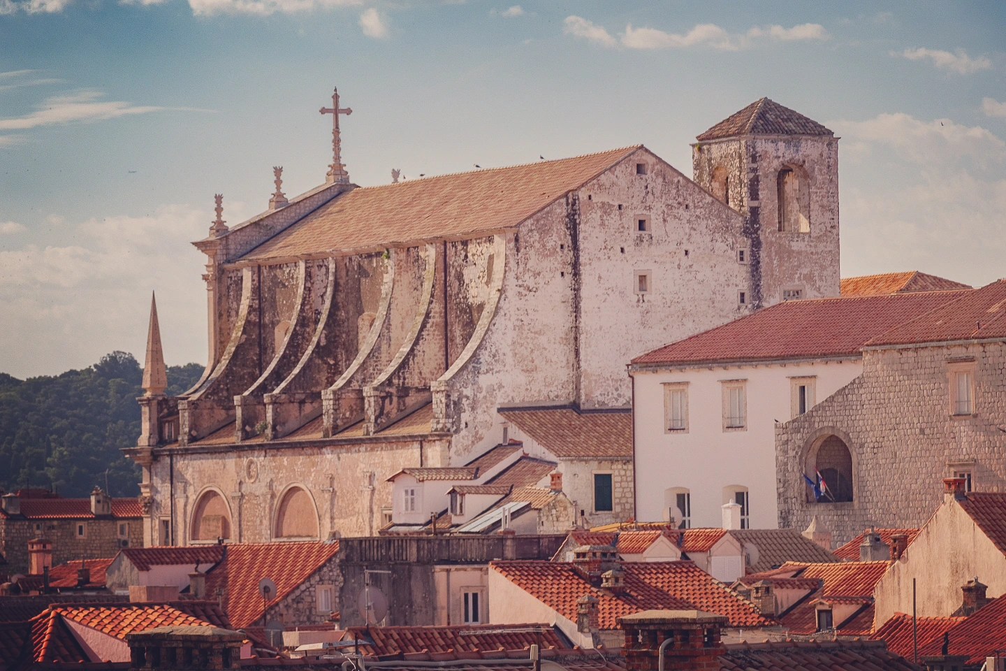 The Baroque Church of St. Ignatius rising above the terracotta rooftops of Dubrovnik’s Old Town.