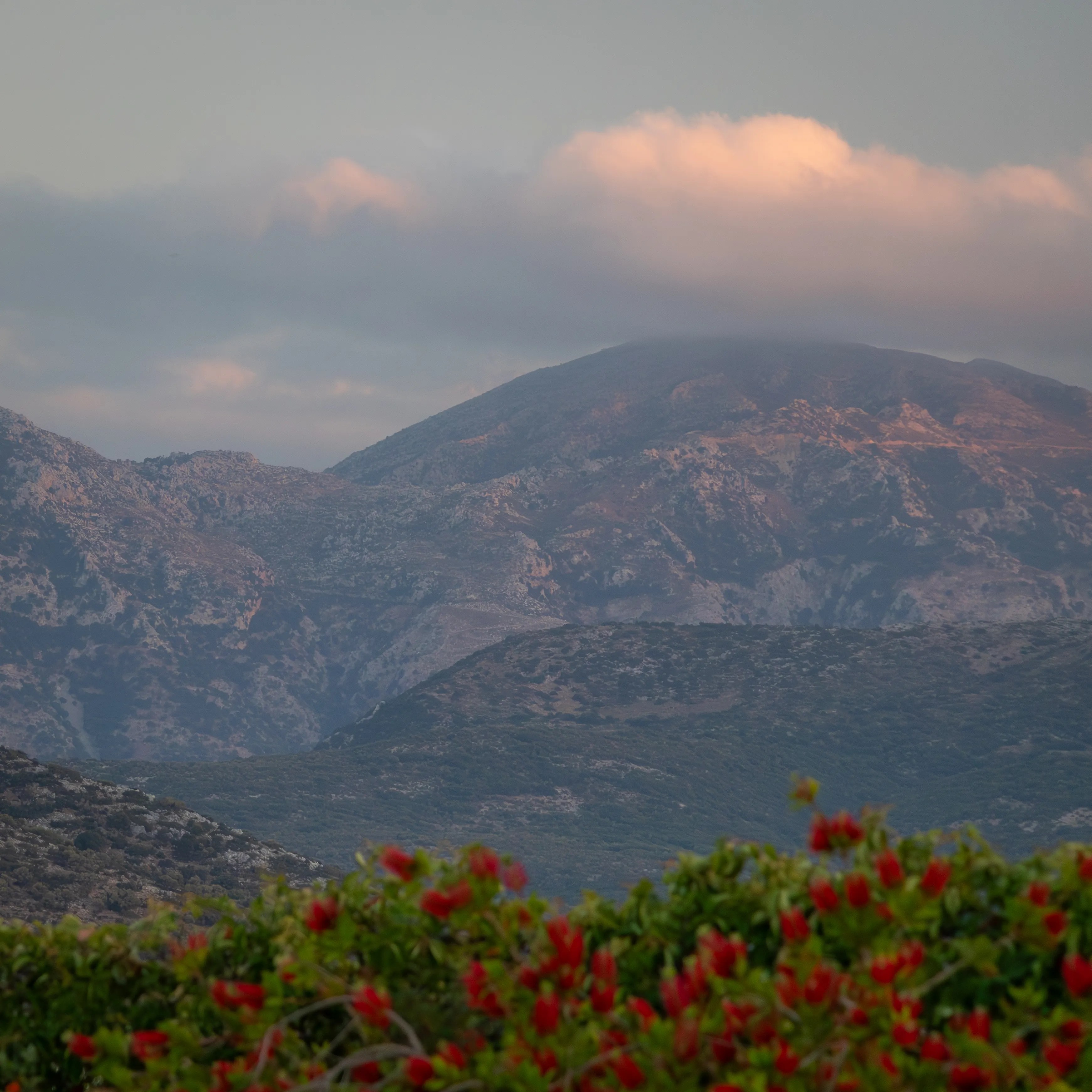 Mountain ridge in soft evening light with clouds above, seen from Village Heights Resort in Hersonissos.