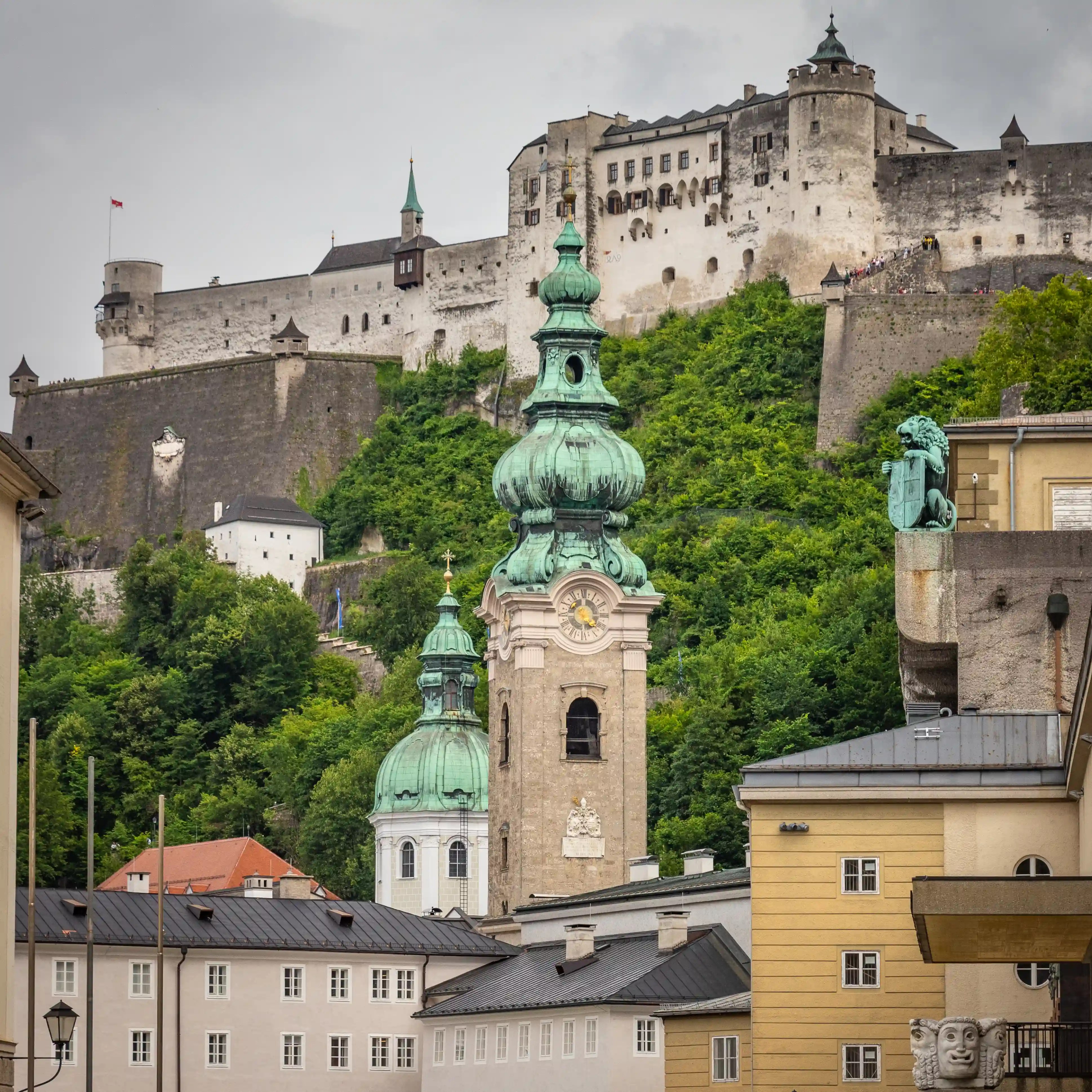 Salzburg church towers with Hohensalzburg Fortress rising above the city