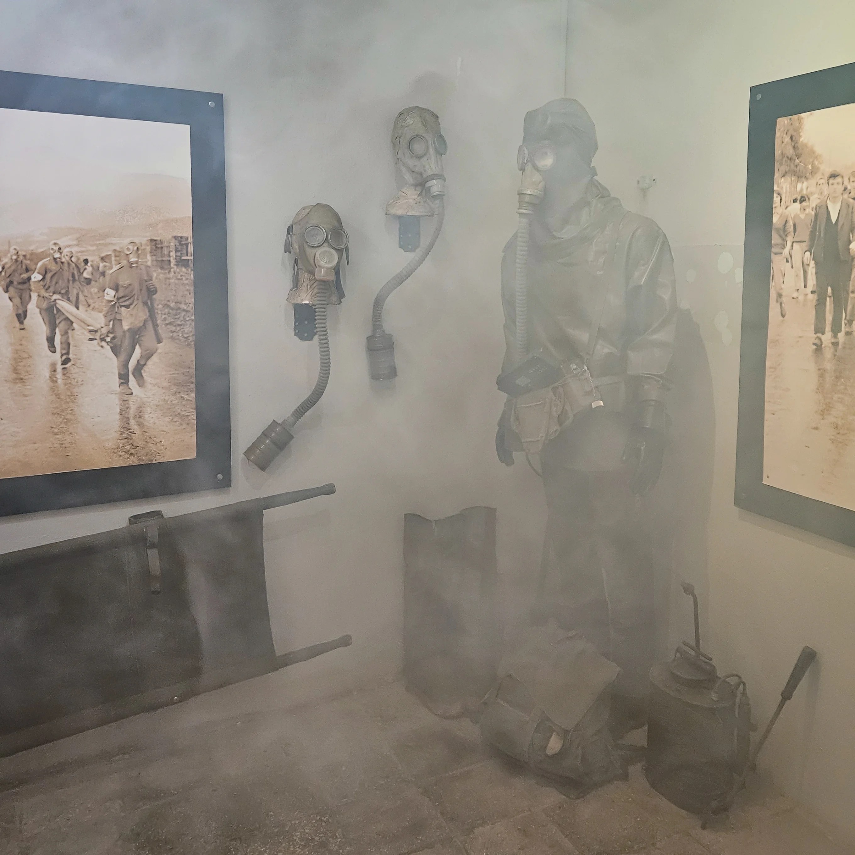 Protective gas masks and chemical protection equipment displayed inside Bunk'Art 1.