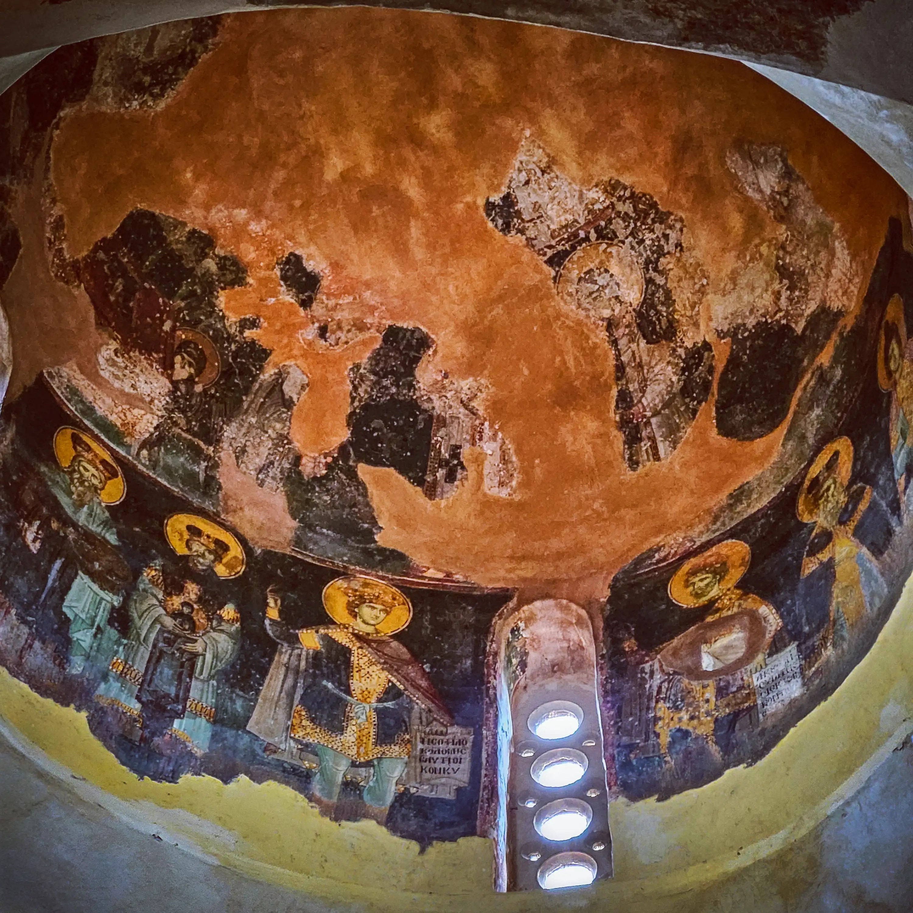 Surviving frescoes inside the dome of Holy Trinity Church in Berat Castle.