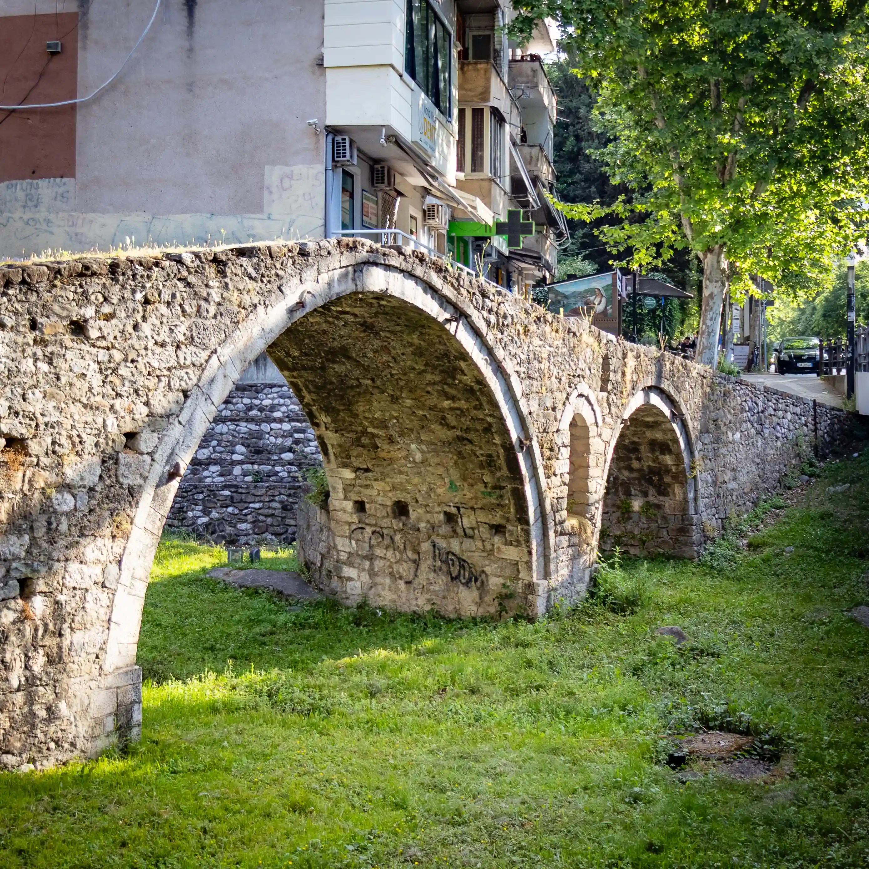 The Tanners' Bridge in Tirana spanning the former Lanë stream bed with three stone arches.