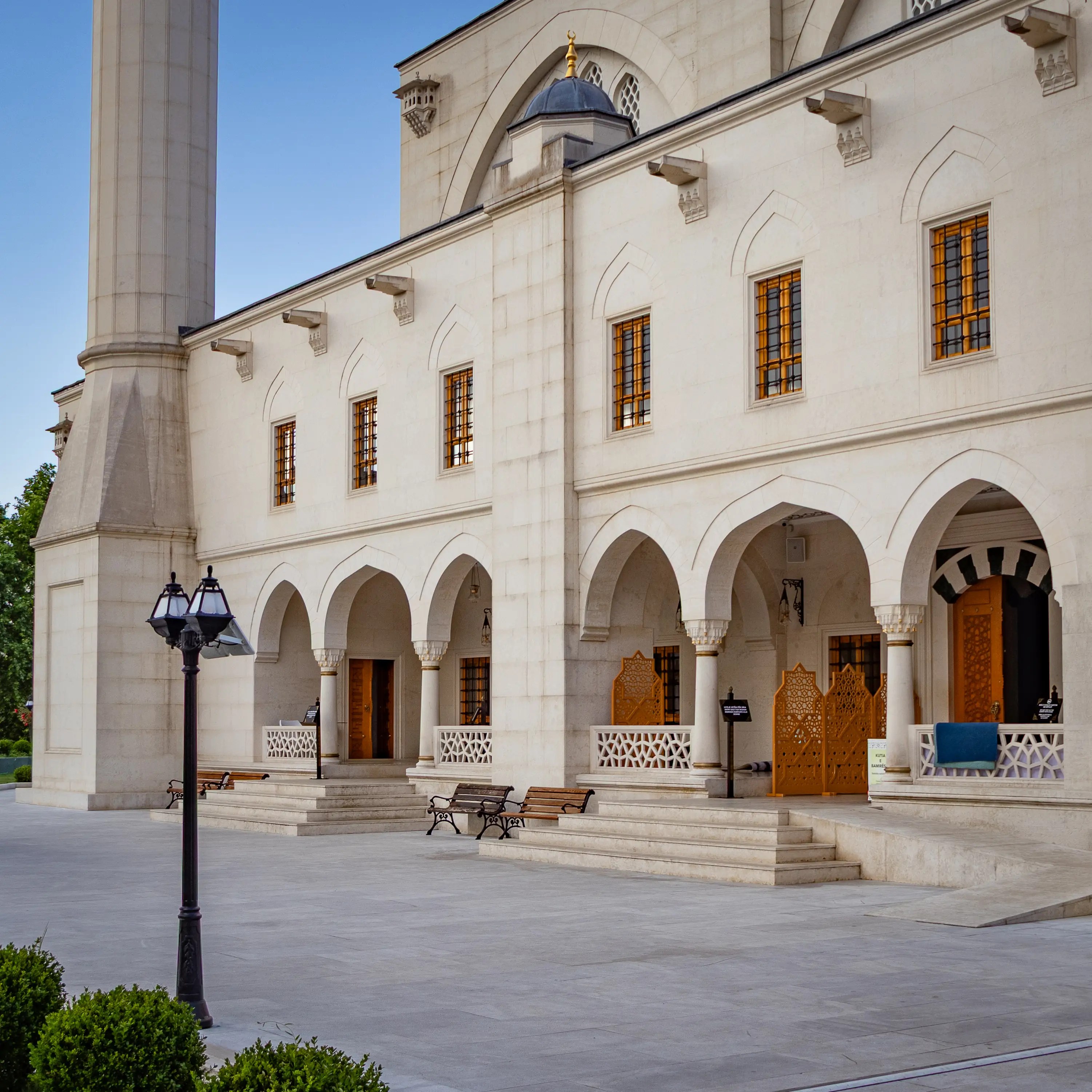 Arcaded exterior walkway and entrance area of the Grand Mosque of Tirana.