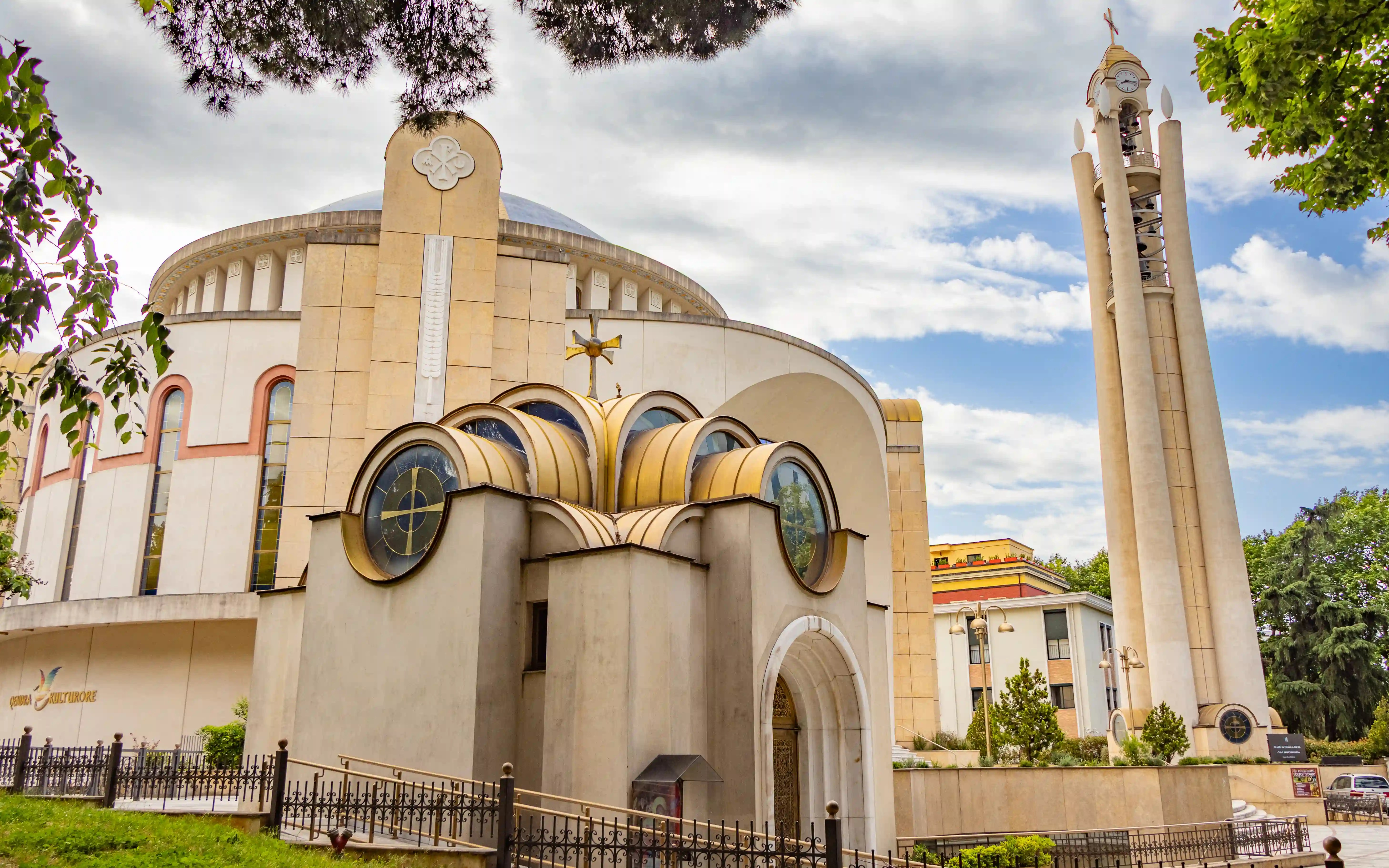 Exterior view of the Resurrection of Christ Orthodox Cathedral and bell tower in Tirana.