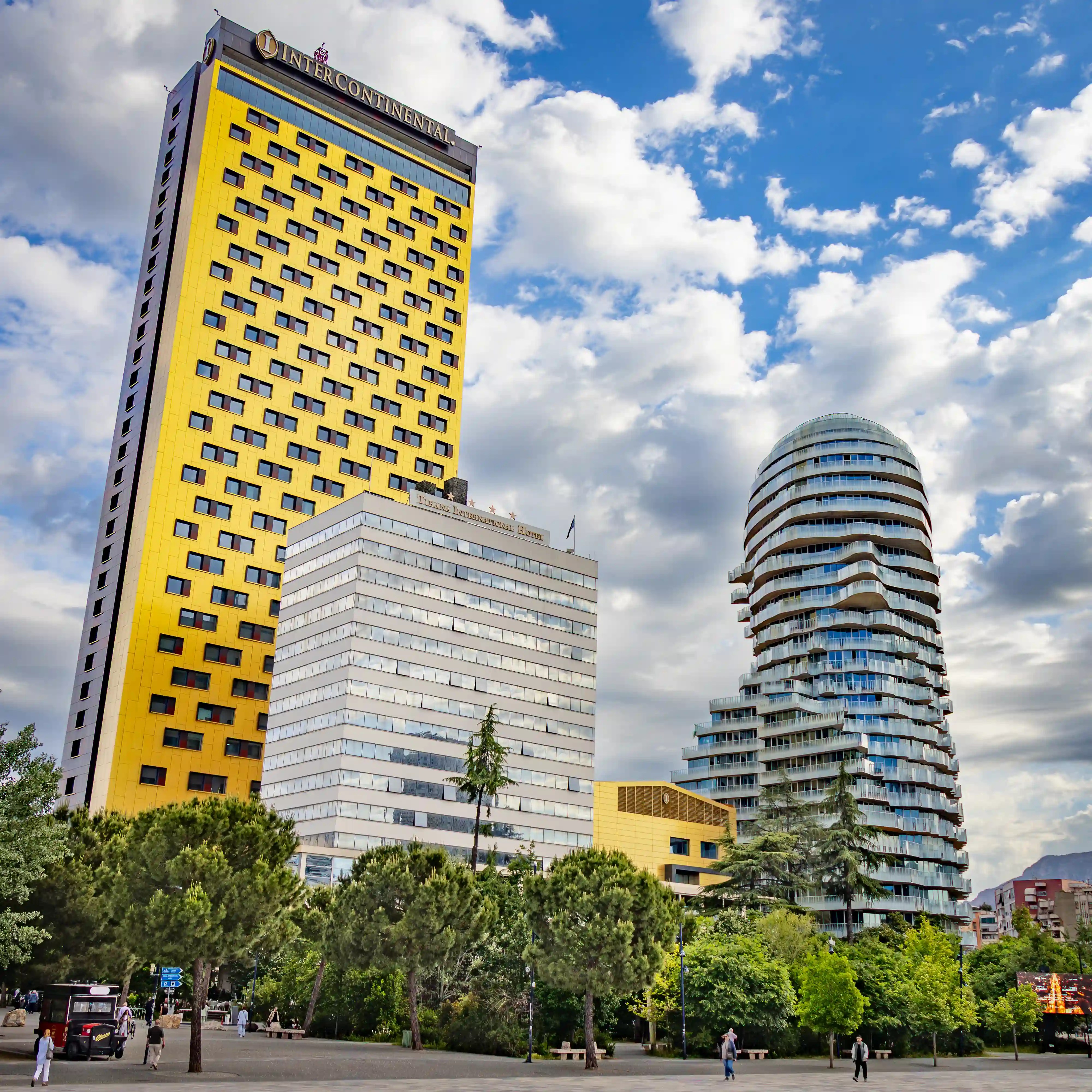Modern high-rise buildings overlooking Skanderbeg Square in Tirana, Albania.