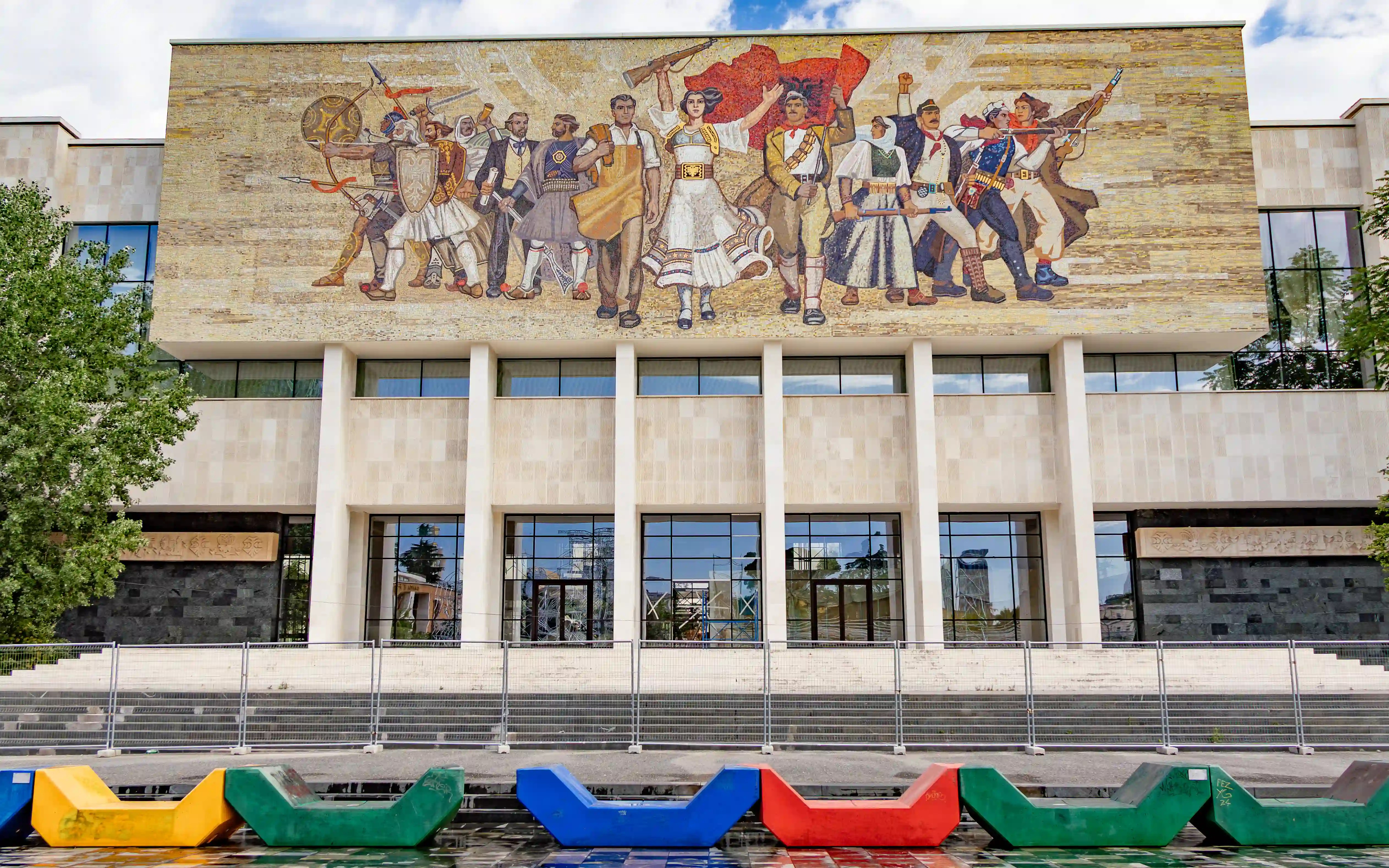 Large historical mosaic on the facade of the National Historical Museum in Tirana, Albania.