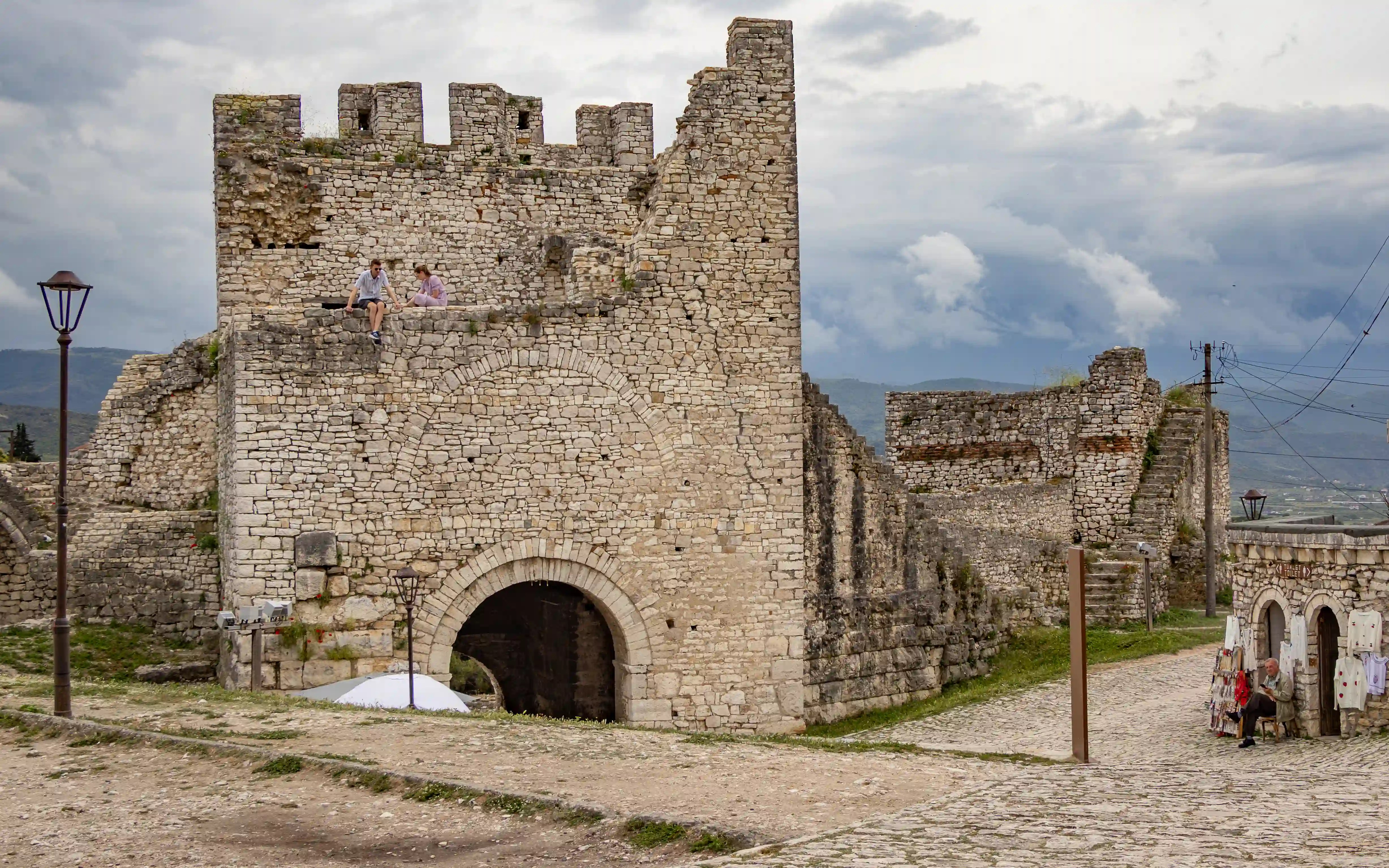 Stone fortifications and entrance structure inside Berat Castle.