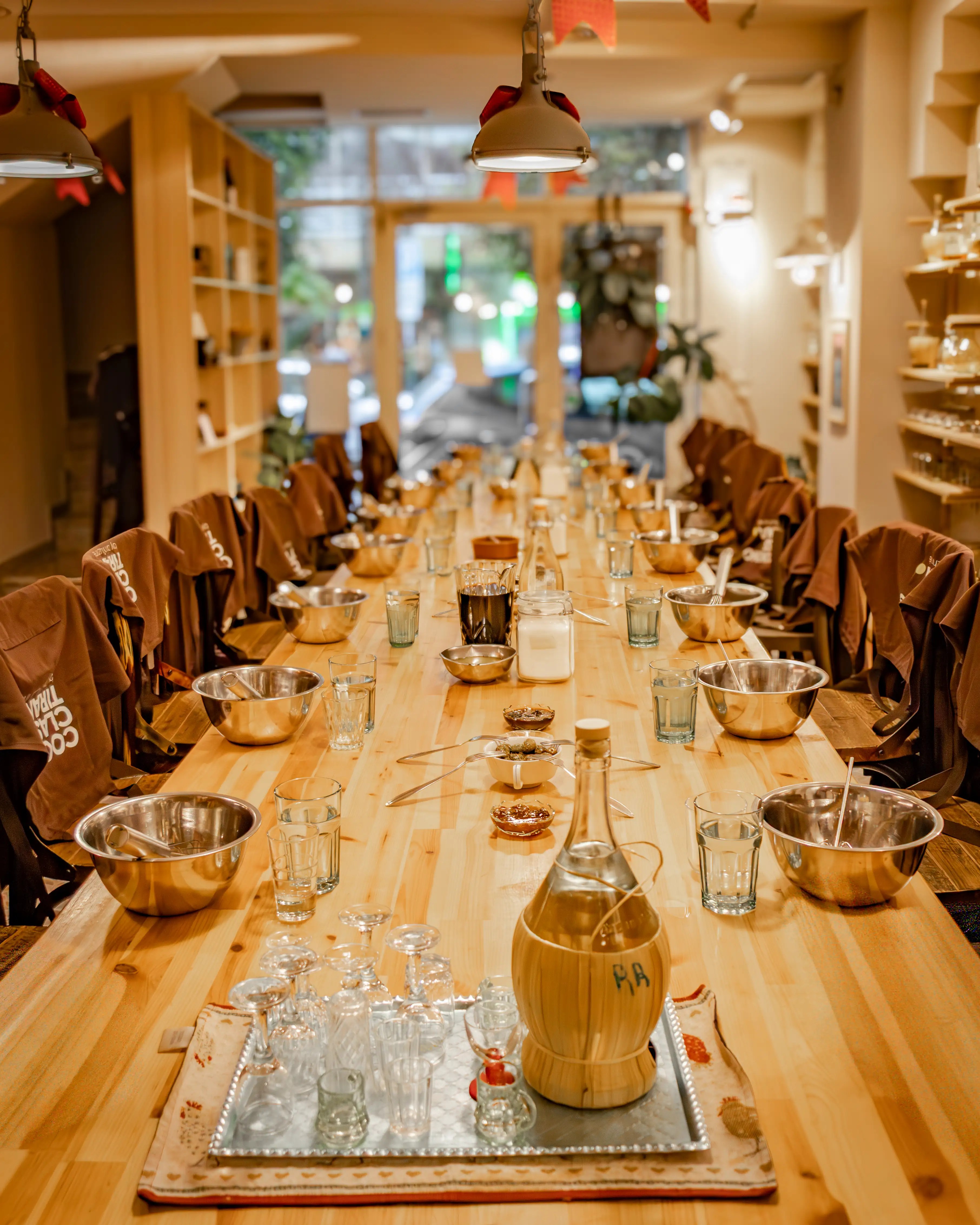 A long table prepared for participants at a cooking class in Tirana.